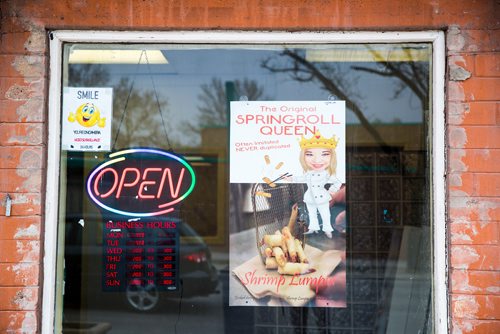 MIKAELA MACKENZIE / WINNIPEG FREE PRESS
Springroll Queen signage at the shop on Notre Dame in Winnipeg on Wednesday, May 15, 2019. For Dave Sanderson story.
Winnipeg Free Press 2019.