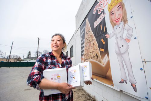 MIKAELA MACKENZIE / WINNIPEG FREE PRESS
Roweliza Lulu, owner of Springroll Queen, poses for a portrait outside of her shop in Winnipeg on Wednesday, May 15, 2019. For Dave Sanderson story.
Winnipeg Free Press 2019.