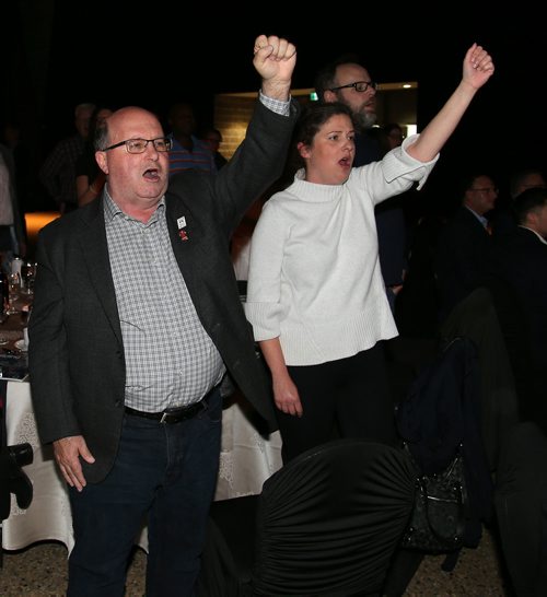 JASON HALSTEAD / WINNIPEG FREE PRESS

L-R: Stan Stapleton and Christina Hatchard of the Union of Safety and Justice Employees sing along on a rendition of 'Solidarity Forever' at the Winnipeg General Strike Centennial Gala Dinner presented by Manitoba's unions on May 15, 2019 at the RBC Convention Centre Winnipeg. (See Sanders story)