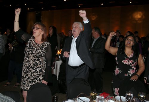 JASON HALSTEAD / WINNIPEG FREE PRESS

L-R: Marianne Hladun, Chris Aylward and Sharon DeSouza of PSAC sing along on a rendition of 'Solidarity Forever'
 at the Winnipeg General Strike Centennial Gala Dinner presented by Manitoba's unions on May 15, 2019 at the RBC Convention Centre Winnipeg. (See Sanders story)