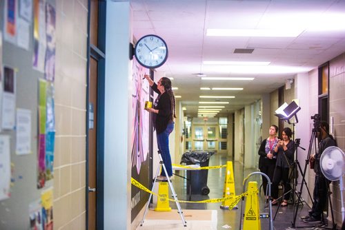 MIKAELA MACKENZIE / WINNIPEG FREE PRESS
Michif artist Christi Belcourt creates a mural titled Thunderbird Uprising as Office of Indigenous Engagement project assistant Sarah Olson (left) and communications coordinator Nickita Longman watch in a hallway in the Isbister Building of the Faculty of Arts at the University of Manitoba in Winnipeg on Thursday, May 16, 2019. 
Winnipeg Free Press 2019.