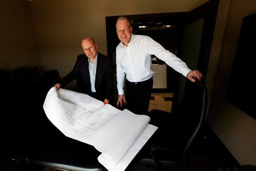 PHIL HOSSACK / WINNIPEG FREE PRESS - Birchwood Automotive Group's Kevin McNeil (left) and Rene Nicholson survey designs for expansion. See Kelly Taylor's story.   - May16, 2019.