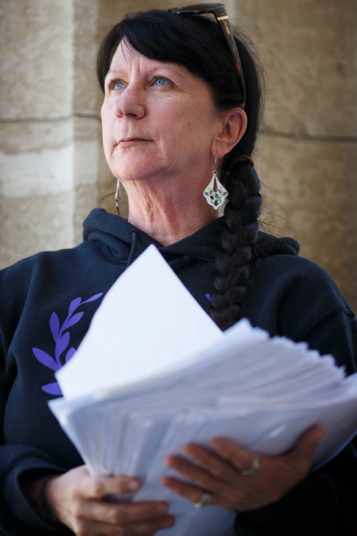 MIKE DEAL / WINNIPEG FREE PRESS
Carrying an armful of documents she is handing over to the NDP the Official Opposition, Arlene Last-Kolb has been working with Overdose Manitoba to petition the provincial government to take action on the addictions crises.
190517 - Friday, May 17, 2019.