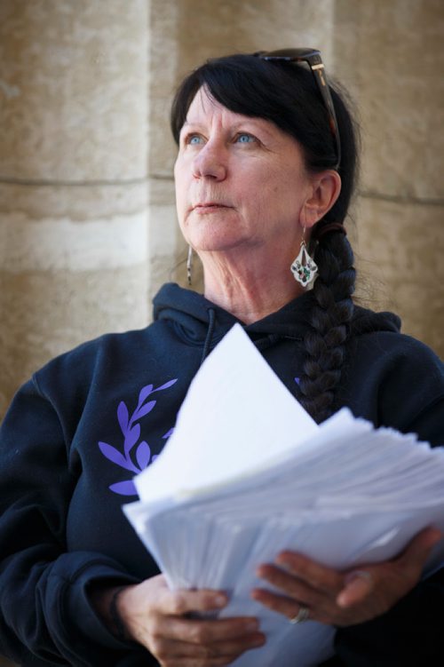 MIKE DEAL / WINNIPEG FREE PRESS
Carrying an armful of documents she is handing over to the NDP the Official Opposition, Arlene Last-Kolb has been working with Overdose Manitoba to petition the provincial government to take action on the addictions crises.
190517 - Friday, May 17, 2019.