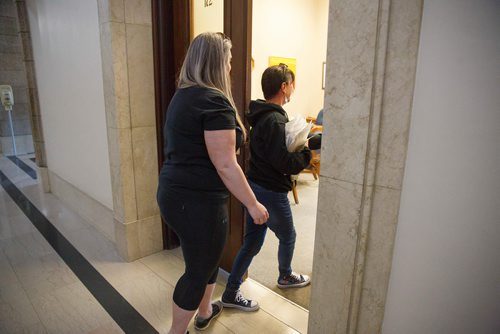 MIKE DEAL / WINNIPEG FREE PRESS
Carrying an armful of documents she is handing over to the NDP the Official Opposition, Arlene Last-Kolb (right) has been working with Rebecca Rummery (left) cofounder of Overdose Manitoba to petition the provincial government to take action on the addictions crises.
190517 - Friday, May 17, 2019.