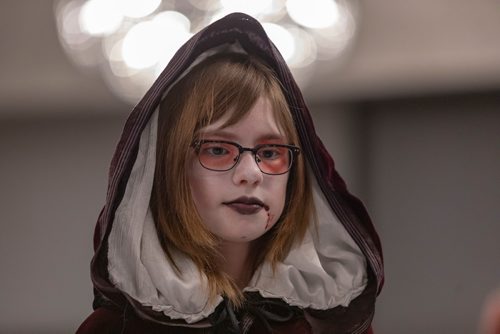 SASHA SEFTER / WINNIPEG FREE PRESS
Molly Calder (9) impresses the judges with her homemade Vamp the Vampire costume during the masquerade judging at the 36th annual KeyCon, Manitoba's largest and longest running science fiction and fantasy convention.
190518 - Saturday, May 18, 2019.
