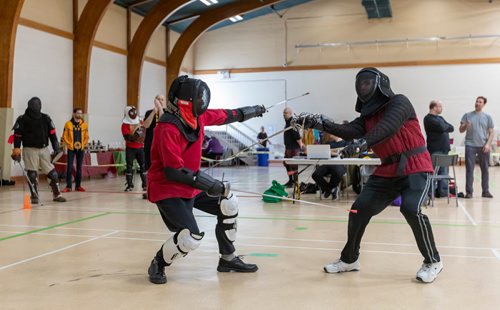 SASHA SEFTER / WINNIPEG FREE PRESS
Trevor Ermet (left) and Nicholas McConnell battle each other with rapier and dagger during the first annual International Historical European Martial Arts Tournament put on by the Winnipeg based Valour Historical European Martial Arts Academy held in the Universite de St. Boniface's Sportex Gym.
190518 - Saturday, May 18, 2019.