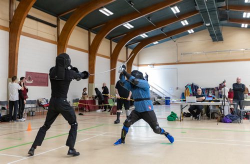 SASHA SEFTER / WINNIPEG FREE PRESS
Cody Skillen (left) and Bernhard Jungreithmeier  battle each other with long swords during the first annual International Historical European Martial Arts Tournament put on by the Winnipeg based Valour Historical European Martial Arts Academy held in the Universite de St. Boniface's Sportex Gym.
190518 - Saturday, May 18, 2019.