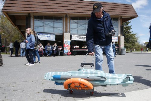 JOHN WOODS / WINNIPEG FREE PRESS
Dave Smith of the Winnipeg Model Boat Club prepares to launch his model German Seahunt submarine at the Assiniboine Park duck pond in Winnipeg Sunday, May 19, 2019. 
Reporter: Intersection - Sanderson