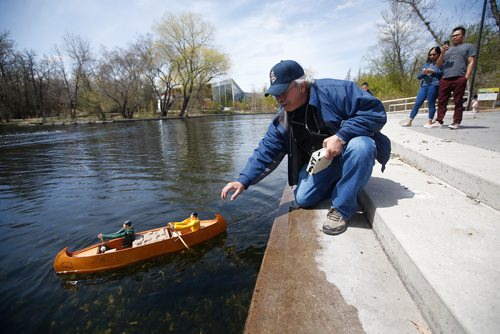 JOHN WOODS / WINNIPEG FREE PRESS
Claude Dupuis of the Winnipeg Model Boat Club launches his model canoe powered by two wooden spoons and an electric motor at the Assiniboine Park duck pond in Winnipeg Sunday, May 19, 2019. 
Reporter: Intersection - Sanderson
