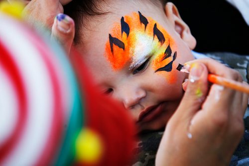 JOHN WOODS / WINNIPEG FREE PRESS
Benjamin, 5 months, gets his first face painting while visiting the family area at the Assiniboia downs in Winnipeg Monday, May 20, 2019. 
Reporter: Standup