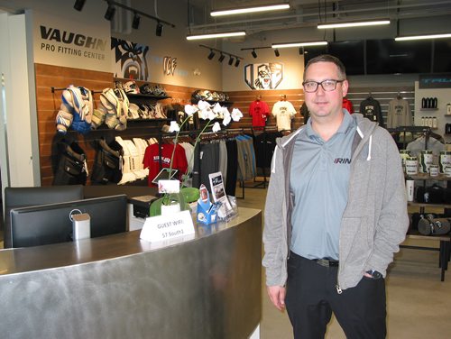 Canstar Community News May 16, 2019 - The Rink president Ryan Cyr, of La Salle, stands in front of the store selling Winnipeg Ice and The Rink merchandise as well as housing a precision skating sharpening service in The Rink's new location at 57 South Landing in the RM of Macdonald. (ANDREA GEARY/CANSTAR COMMUNITY NEWS)