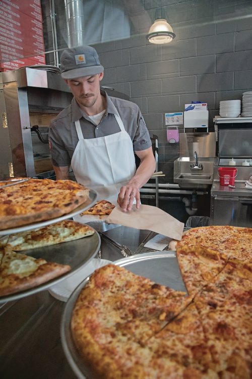 Canstar Community News Wall Street Slice, the new pizza shop from the owners of Red Ember, opened to the public on May 15. (EVA WASNEY/CANSTAR COMMUNITY NEWS/METRO)