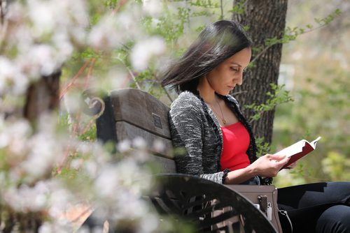 RUTH BONNEVILLE / WINNIPEG FREE PRESS 


Justin Ezzahir takes advantage of the warm spring day as she reads her book on her lunch break on a park bench next to spring blossoms at Steven Juba Park Tuesday.  



May 21, 2019
