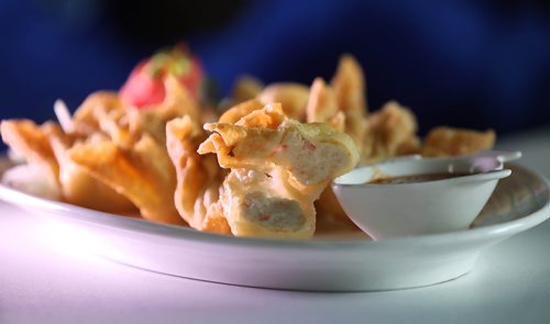 RUTH BONNEVILLE / WINNIPEG FREE PRESS 

ENT - Restaurant Review 
Thailand Foods at 617 Selkirk Ave. 

Owner, Saifon Lacharoen.

Photo of appetizer, Wonton wrapper filled with shredded crab and cream cheese.

May 21, 2019
