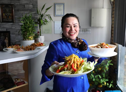 RUTH BONNEVILLE / WINNIPEG FREE PRESS 

ENT - Restaurant Review 
Thailand Foods at 617 Selkirk Ave. 

Owner, Saifon Lacharoen, with mango salad and red curry seafood soup.



May 21, 2019
