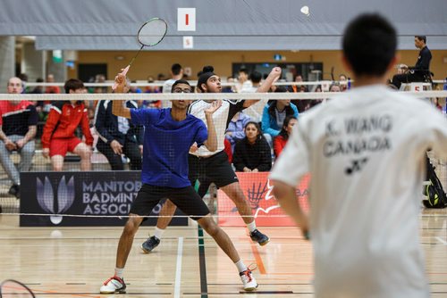 MIKE DEAL / WINNIPEG FREE PRESS
Sehaj Ghotra returns the birdie over the net during his doubles match with partner Aaskash Natarajan against Kevin Wang and Alexander Bianchini during the 2019 Junior/U23 National Badminton Championships at the Sport for Life Centre Wednesday morning.
190522 - Wednesday, May 22, 2019.