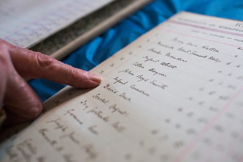 MIKAELA MACKENZIE / WINNIPEG FREE PRESS
Rosalie Gill points to infants in an interment register book at the St. James Anglican Church in Winnipeg on Wednesday, May 22, 2019.  For Brenda Suderman story.
Winnipeg Free Press 2019.