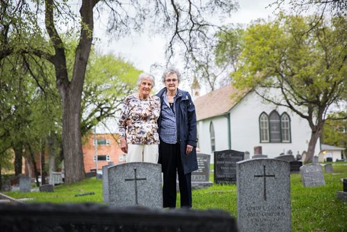 MIKAELA MACKENZIE / WINNIPEG FREE PRESS
Margaret Steele (left) and Rosalie Gill, who found records of over 2,800 miscarried or stillborn babies in a lost register book, pose for a portrait at the St. James Anglican Church in Winnipeg on Wednesday, May 22, 2019. They are planning a memorial garden in this area of the cemetery for the infants. For Brenda Suderman story.
Winnipeg Free Press 2019.