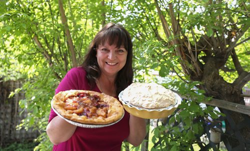 RUTH BONNEVILLE / WINNIPEG FREE PRESS 

LOCAL - pie pop-up

Description: Shel Zolkewich with two pies (fruit and lemon meringue) for story about pie charity.  
More info:
Shel, a writer and food blogger, and two other women (Chris Albi and Susie Parker, not available for photo) are doing a Pie Pop up next week, which is essentially a big pie sale to raise dough  for Main Street Project.

See Doug Speirs story 

May 23, 2019
