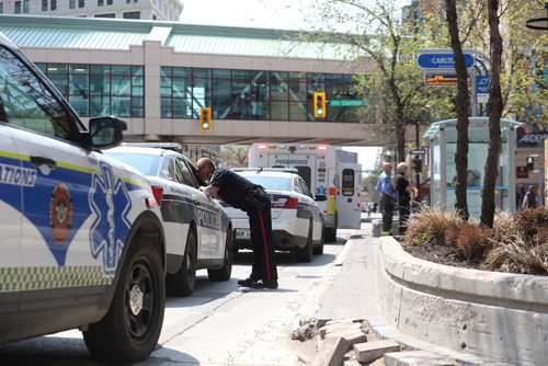 RUTH BONNEVILLE / WINNIPEG FREE PRESS 

LOCAL - Winnipeg Police and emergency personal at a scene on Portage Ave. at Carlton Street Thursday afternoon.  

No other information is available at this time but filed this photo just in case police report something at a later date.    

May 23, 2019
