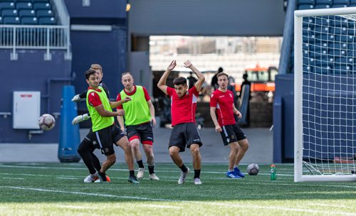 SASHA SEFTER / WINNIPEG FREE PRESS
Valour FC Midfielder Dylan Sacramento (7) jumps to avoid being hit by the ball during a team practice on Investors Group Field.
190523 - Thursday, May 23, 2019.