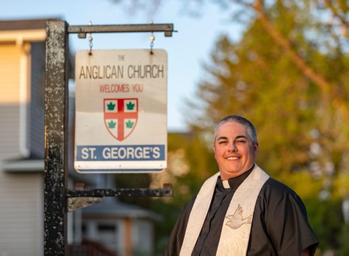 SASHA SEFTER / WINNIPEG FREE PRESS
New Anglican Deacon Theo Robinson wears his stole which features a trans flag outside his Transcona church.
190523 - Thursday, May 23, 2019.