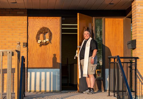 SASHA SEFTER / WINNIPEG FREE PRESS
New Anglican Deacon Theo Robinson wears his stole which features a trans flag outside his Transcona church.
190523 - Thursday, May 23, 2019.