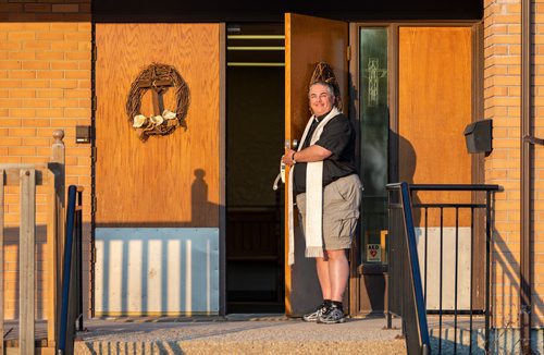 SASHA SEFTER / WINNIPEG FREE PRESS
New Anglican Deacon Theo Robinson wears his stole which features a trans flag outside his Transcona church.
190523 - Thursday, May 23, 2019.