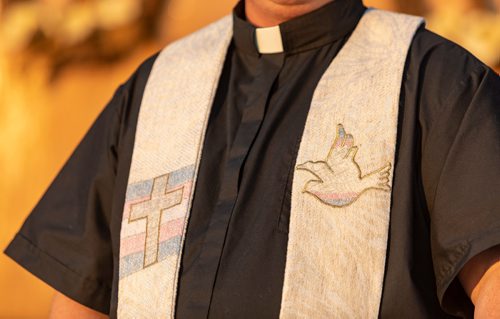 SASHA SEFTER / WINNIPEG FREE PRESS
New Anglican Deacon Theo Robinson wears his stole which features a trans flag outside his Transcona church.
190523 - Thursday, May 23, 2019.