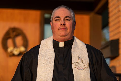 SASHA SEFTER / WINNIPEG FREE PRESS
New Anglican Deacon Theo Robinson wears his stole which features a trans flag outside his Transcona church.
190523 - Thursday, May 23, 2019.