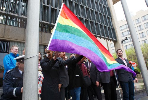 MIKE DEAL / WINNIPEG FREE PRESS
The Pride Winnipeg Flag is raised at City Hall Friday morning with Mayor Brian Bowman, Muhammad Ahsan, president of Pride Winnipeg and other dignitaries in attendance.
190524 - Friday, May 24, 2019.