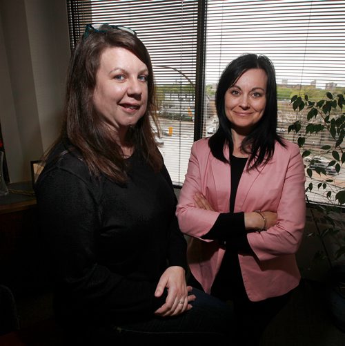 PHIL HOSSACK / WINNIPEG FREE PRESS - Volunteers Dawn Bourbonnais (left) and Jackie Hunt pose in their Volunteer Manitoba Office. See Aaron's story. - May 24, 2019.