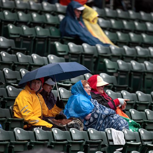 PHIL HOSSACK / WINNIPEG FREE PRESS - Loyal Goldeye fans came prepared in rain gear and umbrellas to wait for a home opener that was rained out Friday night at Shaw Park The forecast for tomorrow is warmer and sunny.  - May24, 2019.