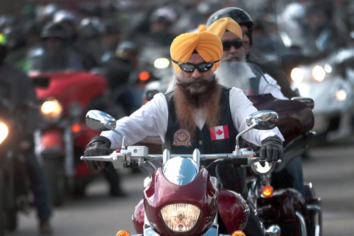 PHIL HOSSACK / WINNIPEG FREE PRESS -Some of the more than 1500 motorcyclists participating in the annual Ride For Dad wait to start their parade down Portage ave from Polo Park Saturday morning. See release.  - May 25, 2019.