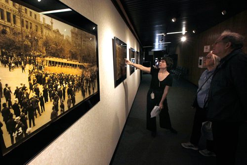 PHIL HOSSACK / WINNIPEG FREE PRESS - A Guide in the Provincial Archives walks spectators participating in Open Doors through an exhibit on the General Strike of 1919 Saturday. See story.  - May 25, 2019.