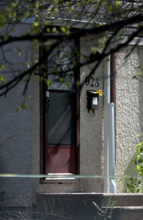 PHIL HOSSACK / WINNIPEG FREE PRESS -An evidence tag (#11) hangs off the mailbox at the scene of a weekend murder at #928 Greencrest ave Saturday. See Melissa Martin Story.  - May 25, 2019.