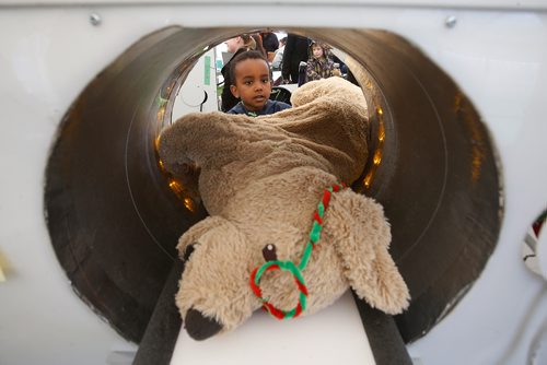 JOHN WOODS / WINNIPEG FREE PRESS
Amani Ephrem, 4, puts his toy dog Miss Doggie in the Teddy Bear Picnic MRI in Assiniboine Park, Winnipeg Sunday, May 26, 2019.

Reporter: ?