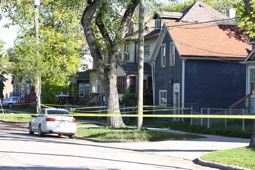 MIKE DEAL / WINNIPEG FREE PRESS
Winnipeg Police caution tape blocks off a portion of Alfred Avenue between Akins and Salter Streets early Monday morning. 
190527 - Monday, May 27, 2019