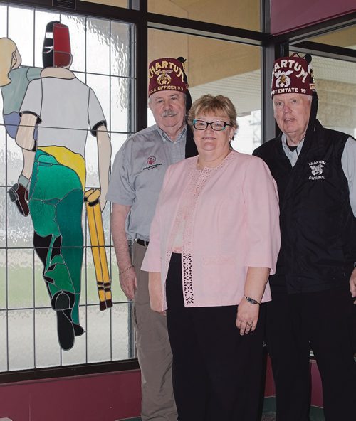 Canstar Community News May 29, 2019 - The Khartum Shriners are hosting its first "Memories" reunion barbecue at the temple on Wilkes Avenue on June 2. They are hoping patients and families who received treatment at Shriners hospitals in Winnipeg and elsehwere, as well as members of the general public, will drop by for an afternoon of reminiscing and fun activties, including clowns, trike demonstrations, and musical performances. Pictured from left, Don Thomson, Brenda McKechnie, and Doug McKechnie. (DANIELLE DA SILVA/SOUWESTER/CANSTAR)