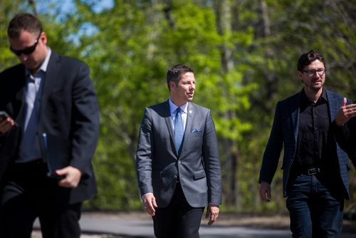 MIKAELA MACKENZIE / WINNIPEG FREE 
Mayor Brian Bowman (left) and councillor Matt Allard walk up to a press conference announcing a road construction working group in Winnipeg on Monday, May 27, 2019.  For Ryan Thorpe story.
Winnipeg Free Press 2019.