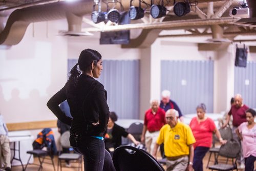 MIKAELA MACKENZIE / WINNIPEG FREE PRESS
Vadivambal Rajagopal leads the yoga part of the Sharing Circle of Wellness class, where seniors meet weekly for yoga, wellness topics, and lunch, at the Hindu Temple on St. Anne's Road in Winnipeg on Tuesday, May 28, 2019.  For Brenda Suderman story.
Winnipeg Free Press 2019.