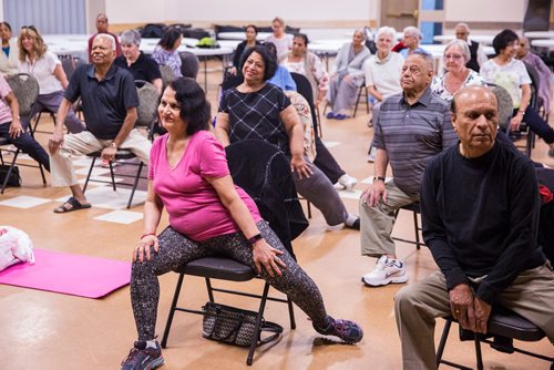 MIKAELA MACKENZIE / WINNIPEG FREE PRESS
Rayesh Misra participates in the Sharing Circle of Wellness class, where seniors meet weekly for yoga, wellness topics, and lunch, at the Hindu Temple on St. Anne's Road in Winnipeg on Tuesday, May 28, 2019.  For Brenda Suderman story.
Winnipeg Free Press 2019.