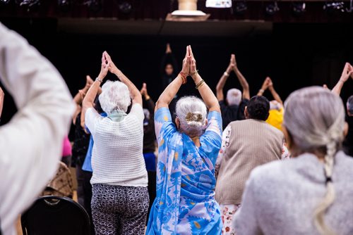 MIKAELA MACKENZIE / WINNIPEG FREE PRESS
Yoga at the Sharing Circle of Wellness class, where seniors meet weekly for yoga, wellness topics, and lunch, at the Hindu Temple on St. Anne's Road in Winnipeg on Tuesday, May 28, 2019.  For Brenda Suderman story.
Winnipeg Free Press 2019.