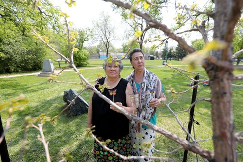 RUTH BONNEVILLE /  WINNIPEG FREE PRESS 



Photo of Mary Graham (dark hair)  and elder Belinda Vandenbroeck, next to the tree/memorial for MMIW  at the Norquay Community Centre Wednesday. 

               
May 29, 2019
