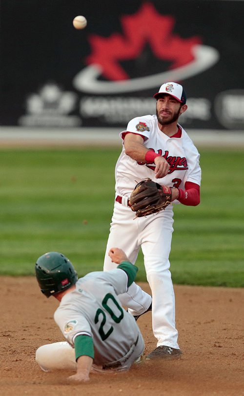 PHIL HOSSACK / WINNIPEG FREE PRESS -  Goldeye 2nd baseman #3Alex Perez hurls the ball to 1st for the double play after tagging out a sliding Gary Southshore Railcat #20 Zach Welz Wednesday, See Taylor Allen's story. - May 29, 2019.