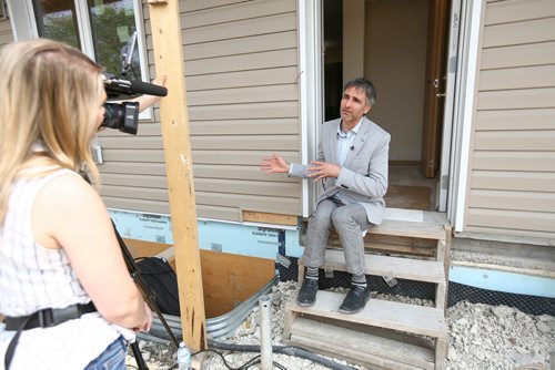MIKE DEAL / WINNIPEG FREE PRESS
Gio Robson, President, Prairie House Performance Inc., at the Habitat for Humanity unveiling of the almost completed first ever Net Zero construction project, on Logan Avenue Thursday morning.
The four-plex at 1860 Logan Avenue is the first Habitat Net Zero home as well as the first of its kind build project by any builder in Manitoba. These homes should produce as much energy as the homeowner uses.
190530 - Thursday, May 30, 2019.