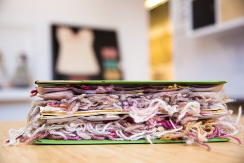 MIKAELA MACKENZIE / WINNIPEG FREE PRESS
A binder showing lichen-dyed wool samples  that Margaret Ferguson researched on display at the Manitoba Crafts Museum and Library in Winnipeg on Thursday, May 30, 2019.  The binder is part of a museum exhibit called the Women of the Manitoba Crafts Guild that runs now through to December. For Carol Sanders story.
Winnipeg Free Press 2019.