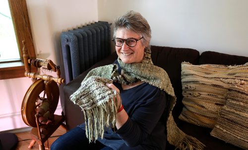 RUTH BONNEVILLE /  WINNIPEG FREE PRESS 

PASSAGES


Portrait of Lyn Ferguson  wearing scarf made of wool that her mother, the late Margaret Ferguson, spun, dyed and wove, and pix of Margarets spinning wheel with spindle of wool that she dyed.

Carol Sanders  | Reporter

May 30, 2019
