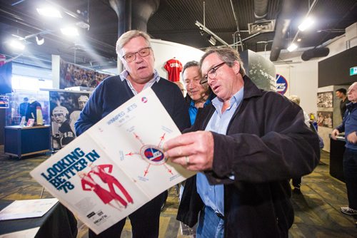 MIKAELA MACKENZIE / WINNIPEG FREE PRESS
Markus Mattsson (left), Bill Lesuk, and Kim Clackson (players from the 1979 Jets team) gather and look at memorabilia at the Manitoba Sports Hall of Fame, celebrating the 40th anniversary of their Avco Cup championship, in Winnipeg on Friday, May 31, 2019.   For Taylor Allen story.
Winnipeg Free Press 2019.